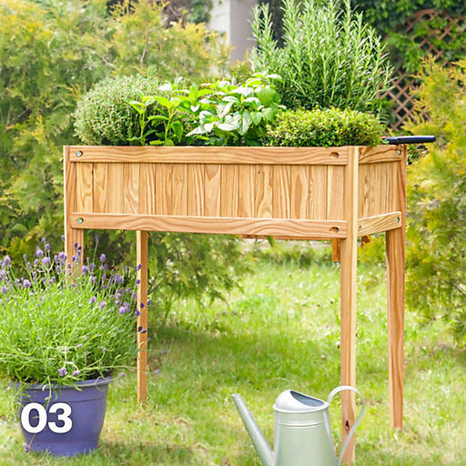 Jagram Home Garden raised larch planter in a garden